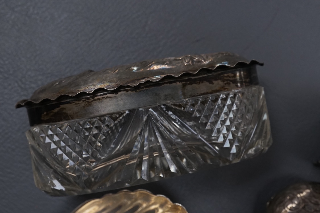 A Dunhill silver plated lighter and seven other items of collectable silver, including a modern silver caddy spoon by Pepper & Hope Ltd, a Victorian silver sovereign case, an Edwardian silver sovereign case, vesta case,